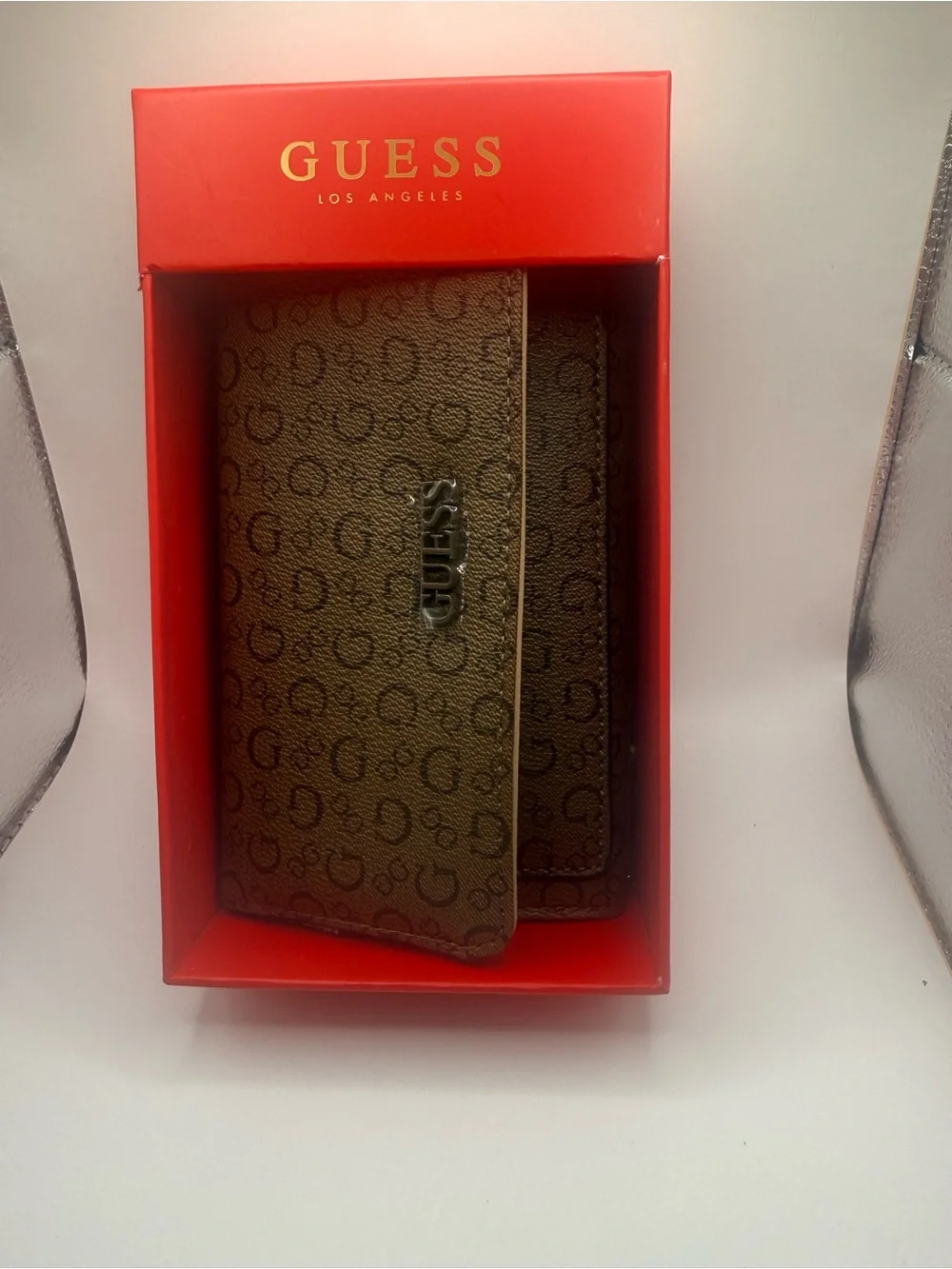 GUESS Brown Logo-Print Continental Wallet with Silver Plaque